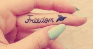 Freedom Tattoo Spruch am Finger